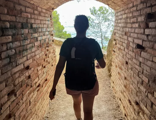 Backroads Guest Walking Through Tunnel